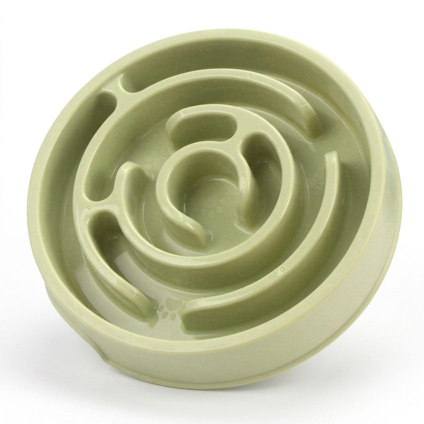 Green silicone slow feeder maze bowl on white background